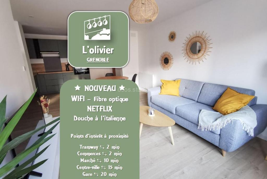 Photo de L'olivier - Appartement moderne et chaleureux - TRAM et PARC