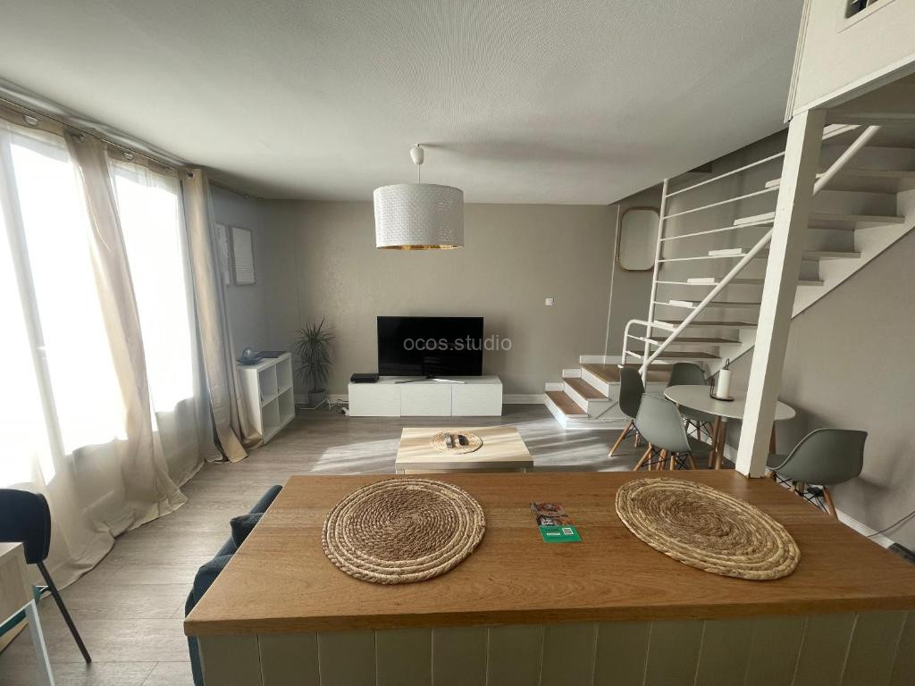 Photo de magnifique Duplex avec 2 chambres et parking gratuit