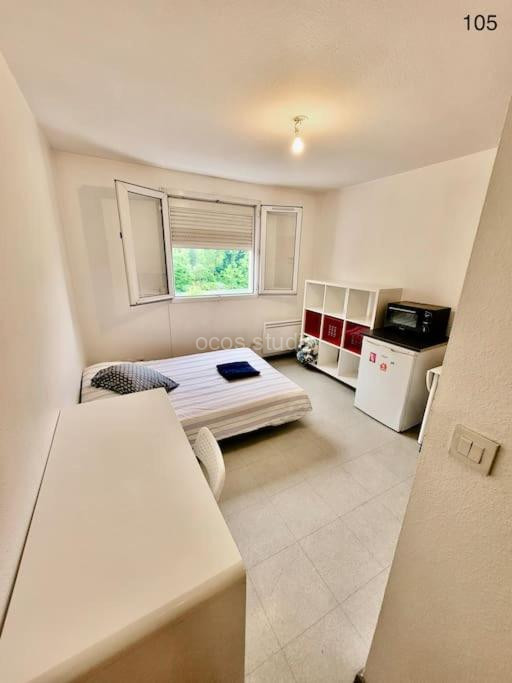 Photo de Studio Centré, Calme & Tout Equipé avec Parking Privé